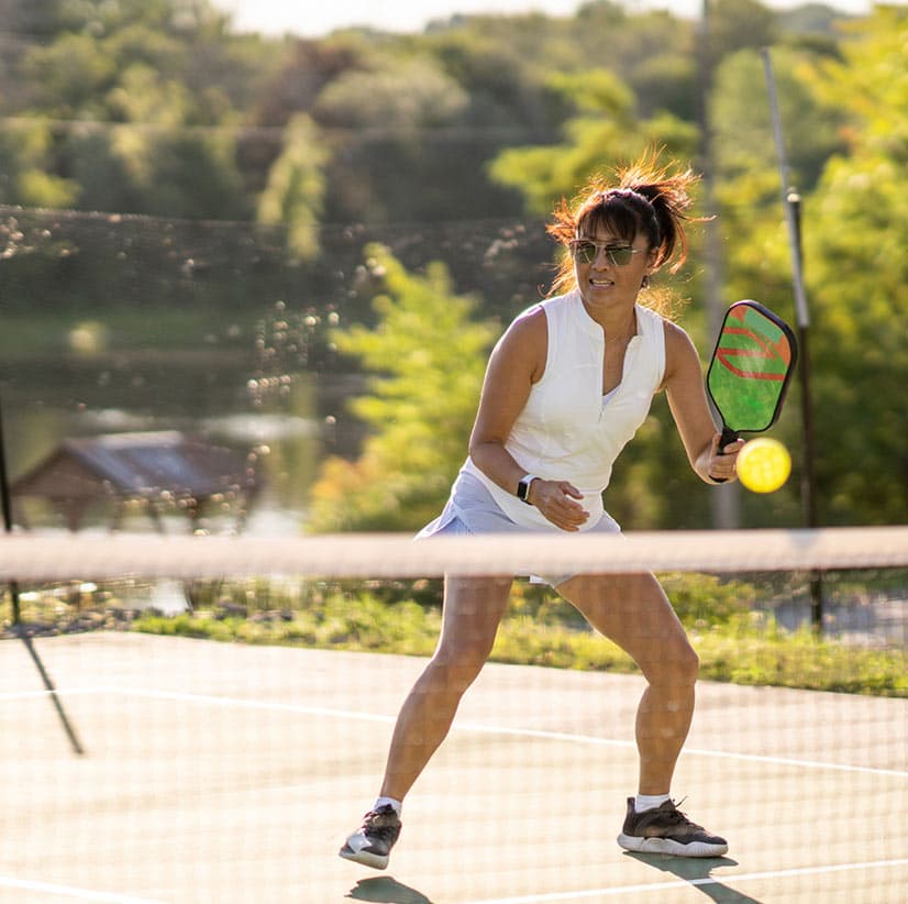 woman playing pickleball